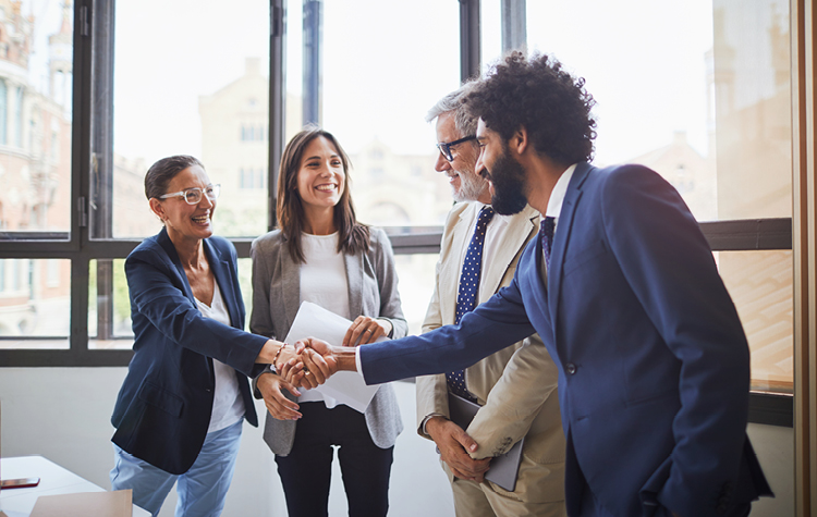 Business people shake hands